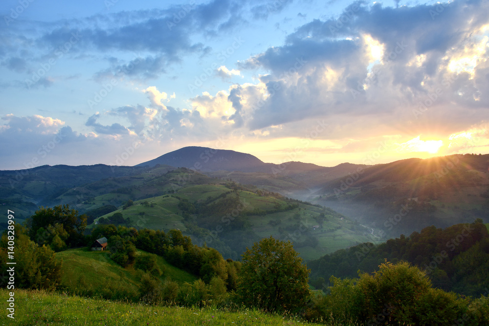 Obraz premium Majestic sunset in the mountains landscape. Overcast sky before storm. Carpathian, Romania, Europe. Beauty world.