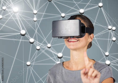 Digitally generated image of woman using virtual reality headset