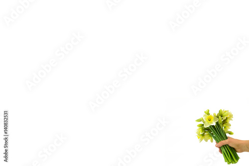 A bunch of narcissuses in a hand