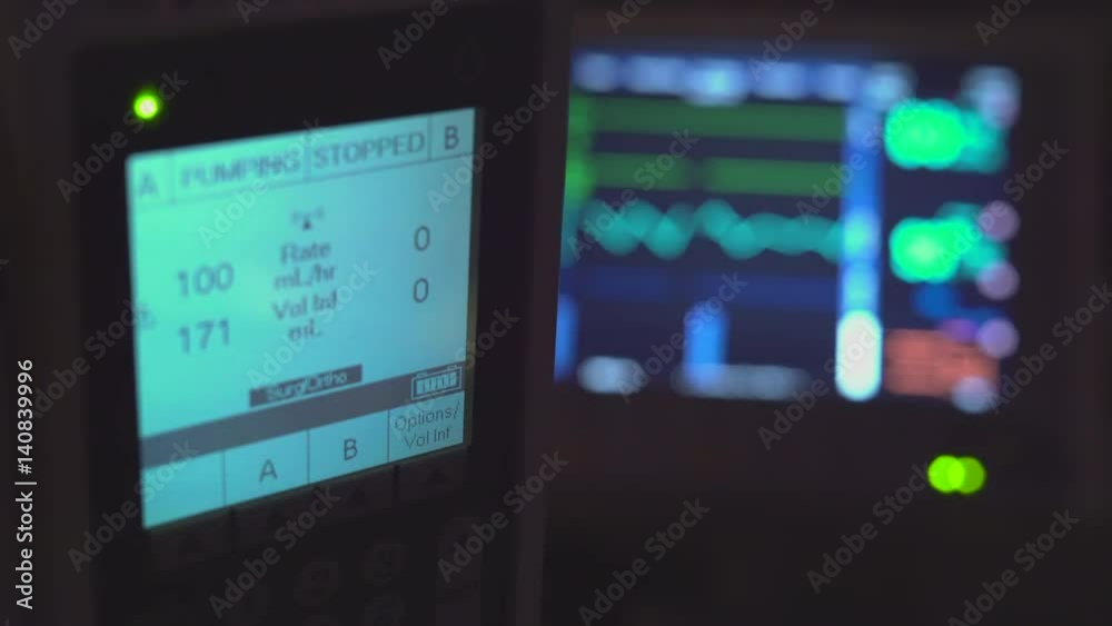 Hospital monitoring equipment in a dark room Hospital monitoring equipment in a dark room