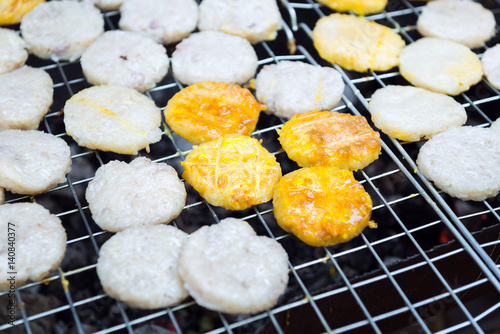 Rice balls - Rice with egg grilled - roasted rice dip egg at street food photo