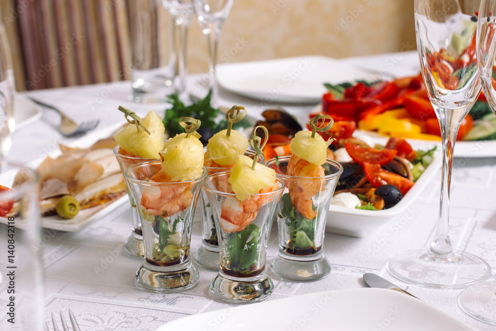 Different kind of canapes at the banquet dessert table Different kind of canapes at the banquet dessert table