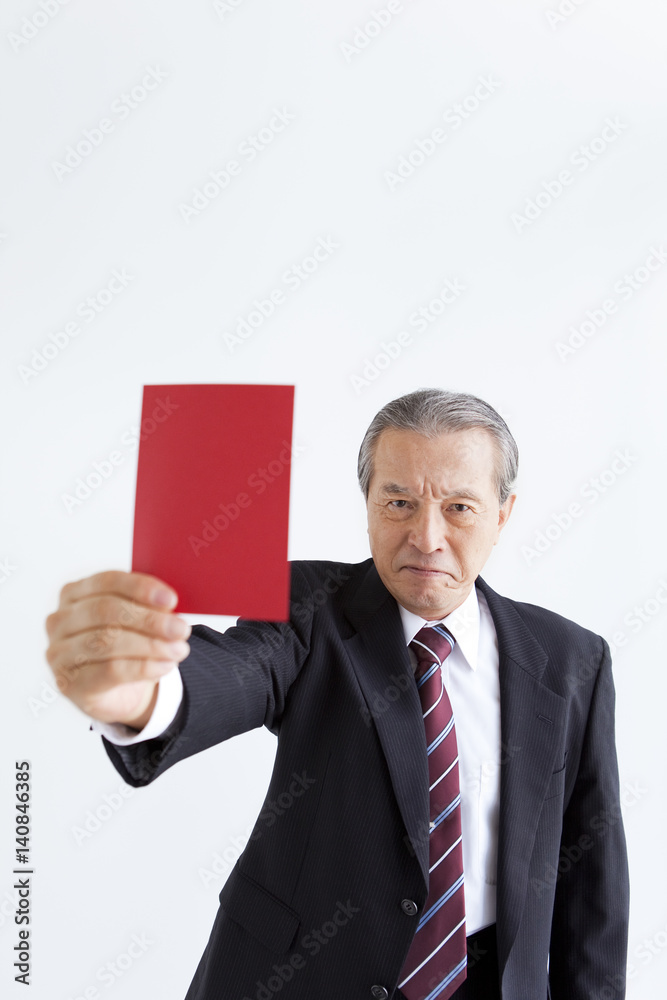 Businessman Showing Red Card