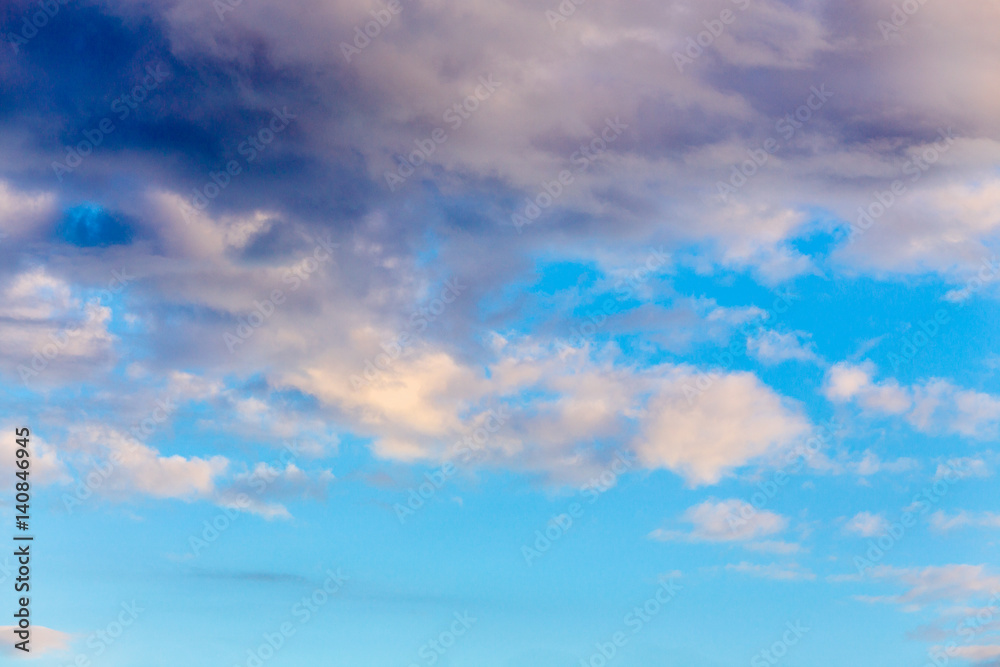 Background blue sky with stormy clouds