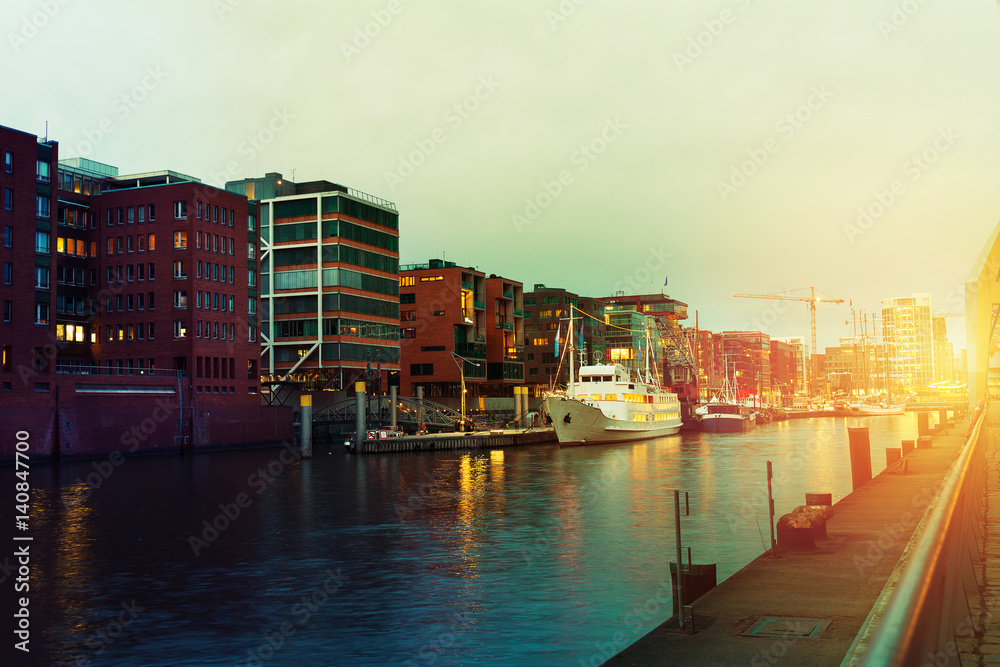 Beautiful Picture of Sunset in Port City with Water, Ships and Bridge. Toning. Hamburg, Germany.