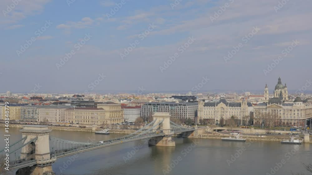 Amazing view on St Stephens Cathedral in Budapest, Hungary. Panoramic view of Budapest and the river Danube with the Chain bridge. Central Budapest with the Danube in the foreground and buildings. Amazing view on St Stephens Cathedral in Budapest, Hungary. Panoramic view of Budapest and the river Danube with the Chain bridge. Central Budapest with the Danube in the foreground and buildings.