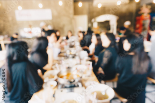 Vintage blurred bokeh of restaurant with people background