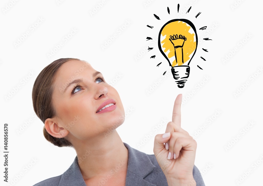 Woman looking at graphic light bulb Woman looking at graphic light bulb