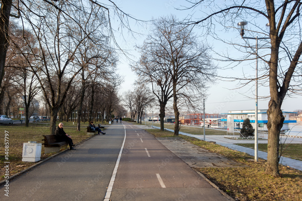 Park and pedestrian zone on the bank of Danube river, in the new part of the city 