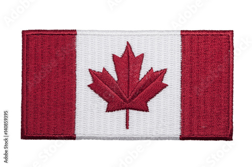 An embroidered Canadian flag patch isolated on a white background.