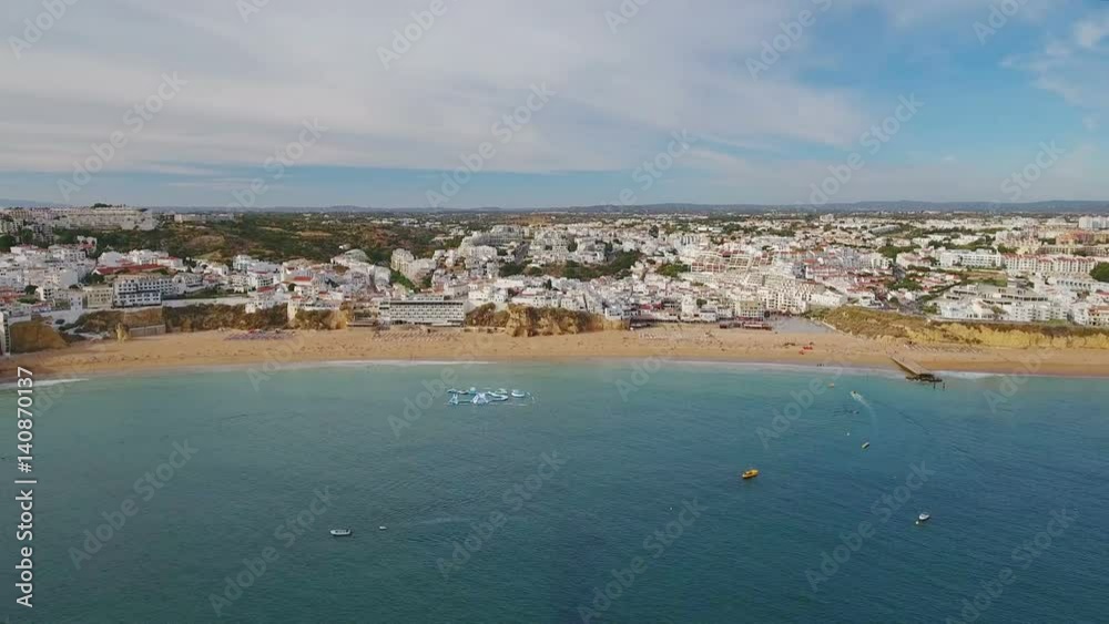 Aerial. Flying a drone to the fishermen's beach in Albufeira. Aerial. Flying a drone to the fishermen's beach in Albufeira.