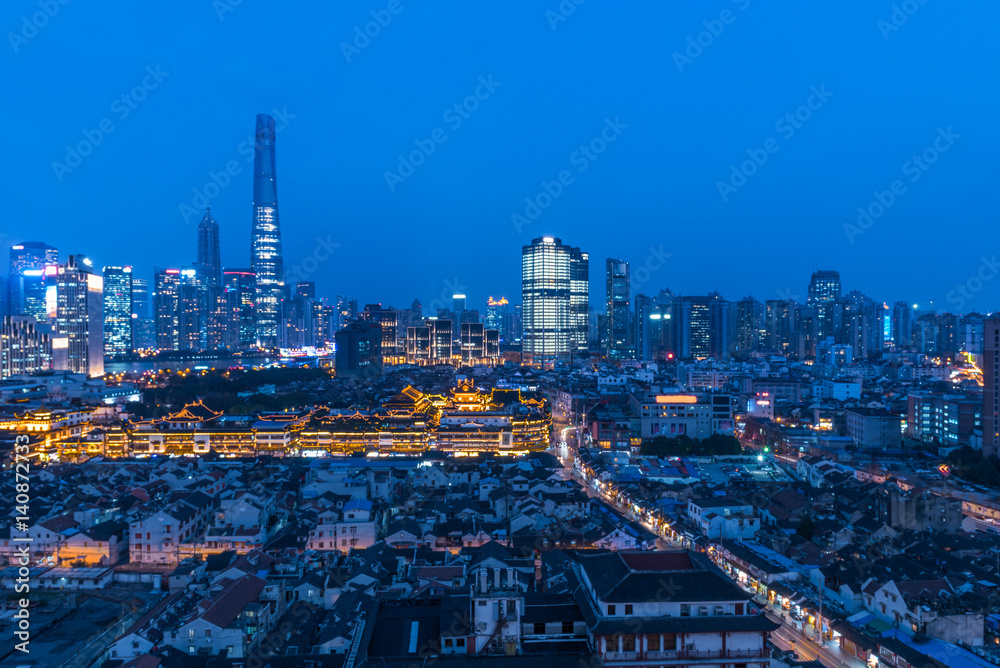 illuminated cityscape at night in financial district of China. illuminated cityscape at night in financial district of China.