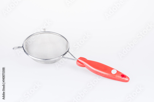 Photos flour sifter on white background