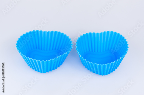A color silicone cake form on a white background