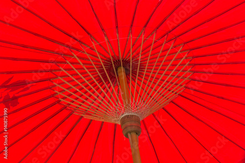Red oriental bamboo umbrella Thailand
