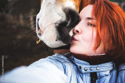 Girl's selfie with a horse
