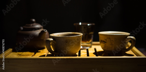 Tea drinking. Evening. Puer. Tea desk. Cups.