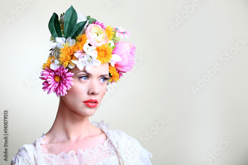 Spring Model with Flowers and blue eyes photo