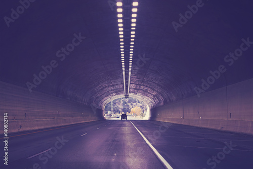 Tunnel on interstate highway 70, color toned picture, Colorado, USA. photo