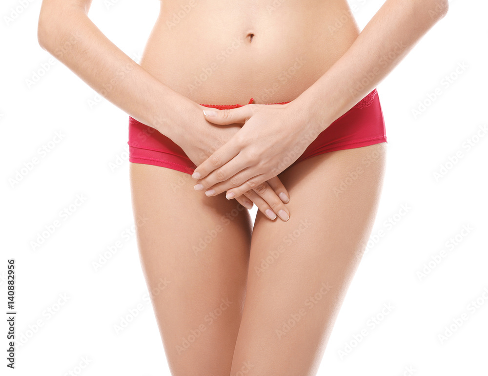 Close up view of young woman on white background. Gynecology concept