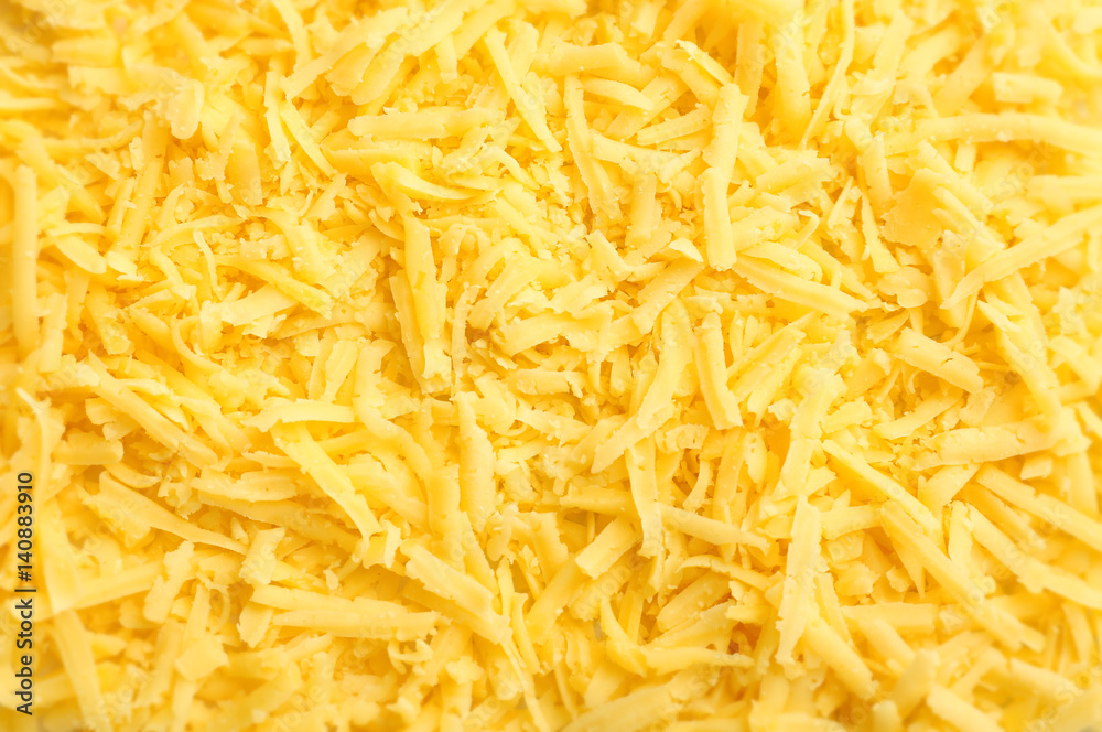 Grated cheese background Grated cheese background