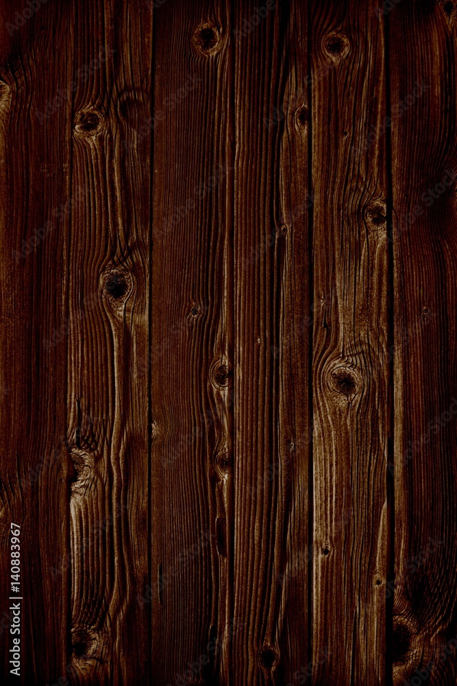 Naklejka premium Dunkle Holztextur mit braunen Brettern