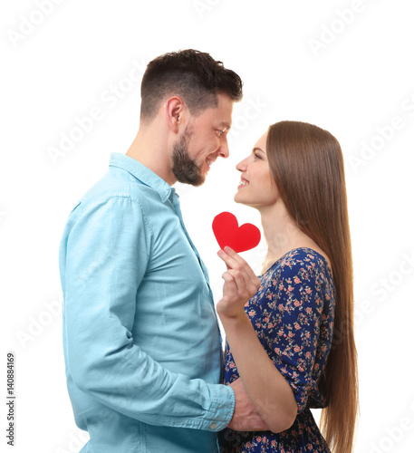 Happy young couple with red...