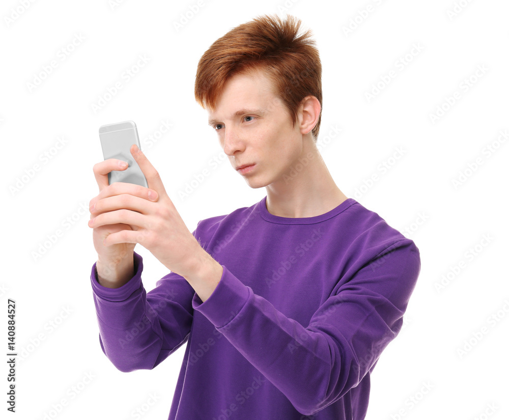 Teenager with mobile phone on white background Teenager with mobile phone on white background