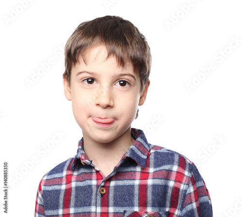 Portrait of cute little boy on white background