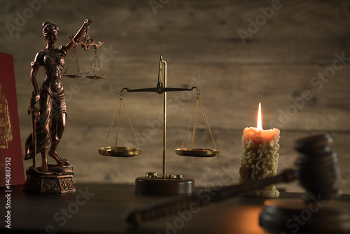 Law and Justice theme, mallet of the judge, justice scale, hourglass, books, wooden rustic desk