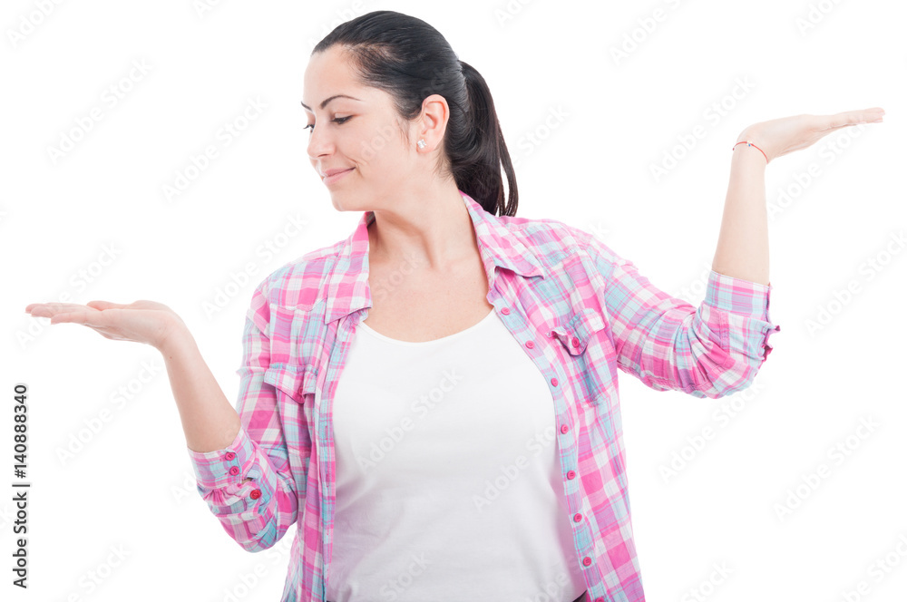 Gorgeous lady showing something invisible in her hands Gorgeous lady showing something invisible in her hands