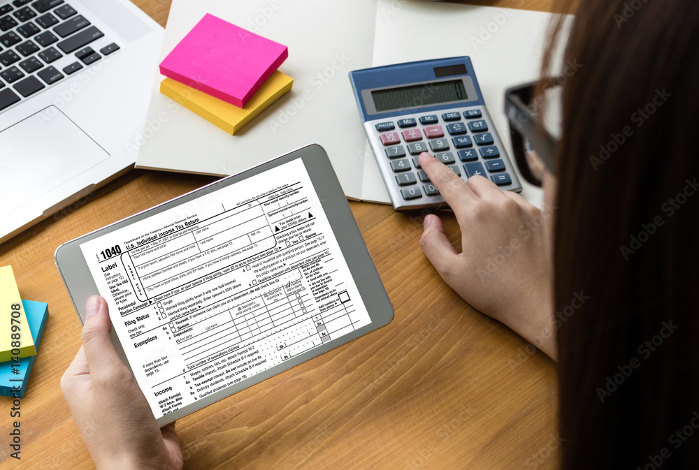 Obraz premium Time for Taxes Planning Money Financial Accounting Taxation and Individual income tax return form