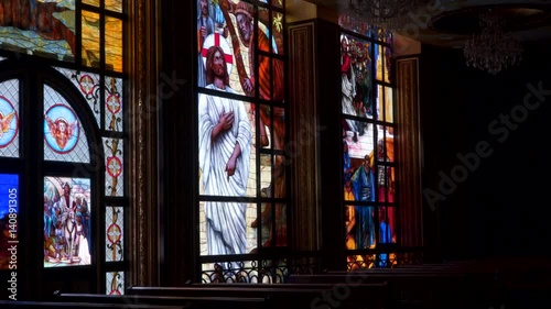 A colorful stained-glass window in the Coptic Christian church in Egypt. 4K UHD video footage.