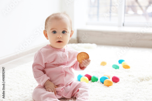 Cute funny baby eating cook...