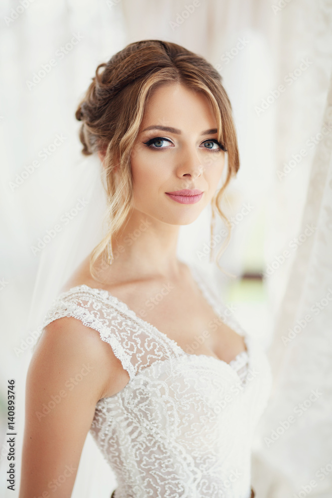 Profile of stunning bride in dress with corset of laces Profile of stunning bride in dress with corset of laces