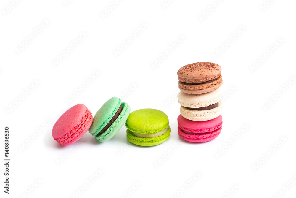 Obraz premium Multicolored macaroon cookies on a white background.