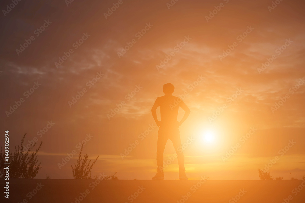 Man show hands silhouette sunset background  