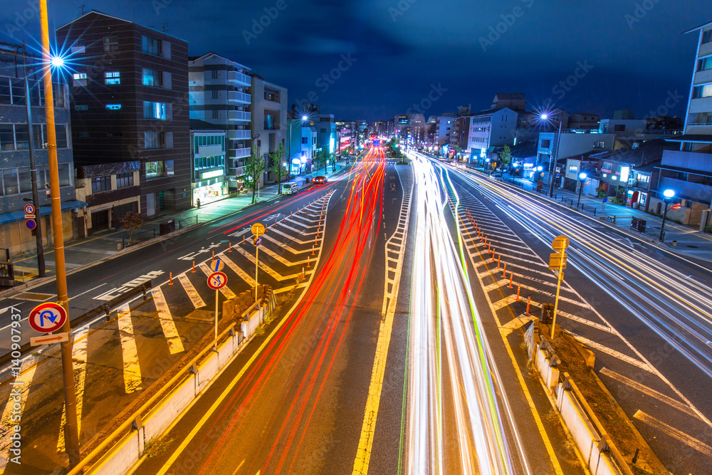 Traffic lights on the street of Kyoto city at night, Japan