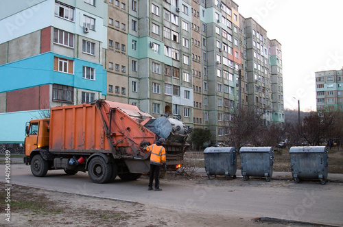 The garbage truck cleans up garbage