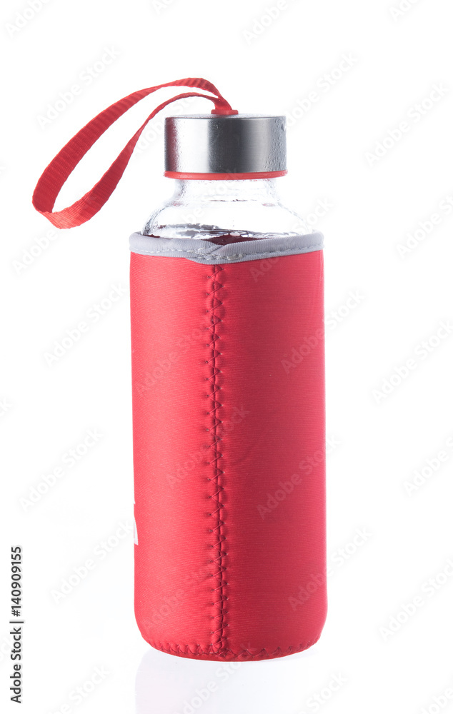 Red energy drink in glass bottle isolated on white Red energy drink in glass bottle isolated on white