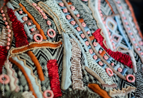 Woven fabric made with intricate patterns and threads