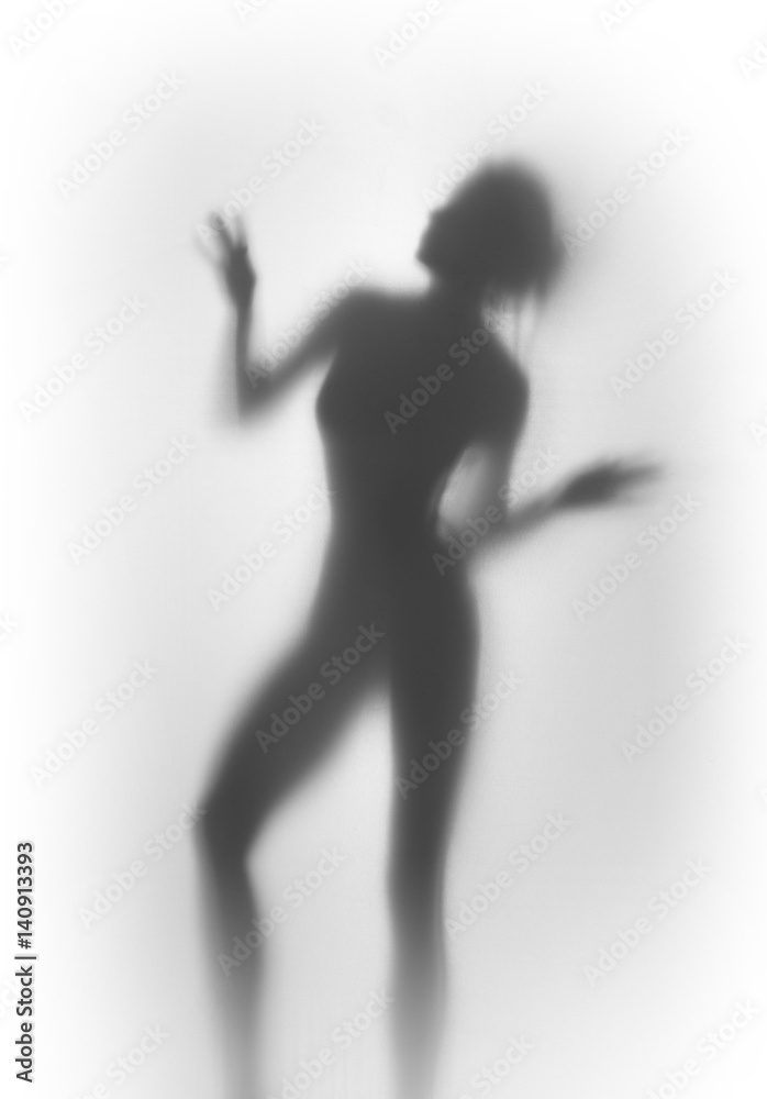 Beautiful and sexy slim woman dances. Body silhouette. Beautiful and sexy slim woman dances. Body silhouette.