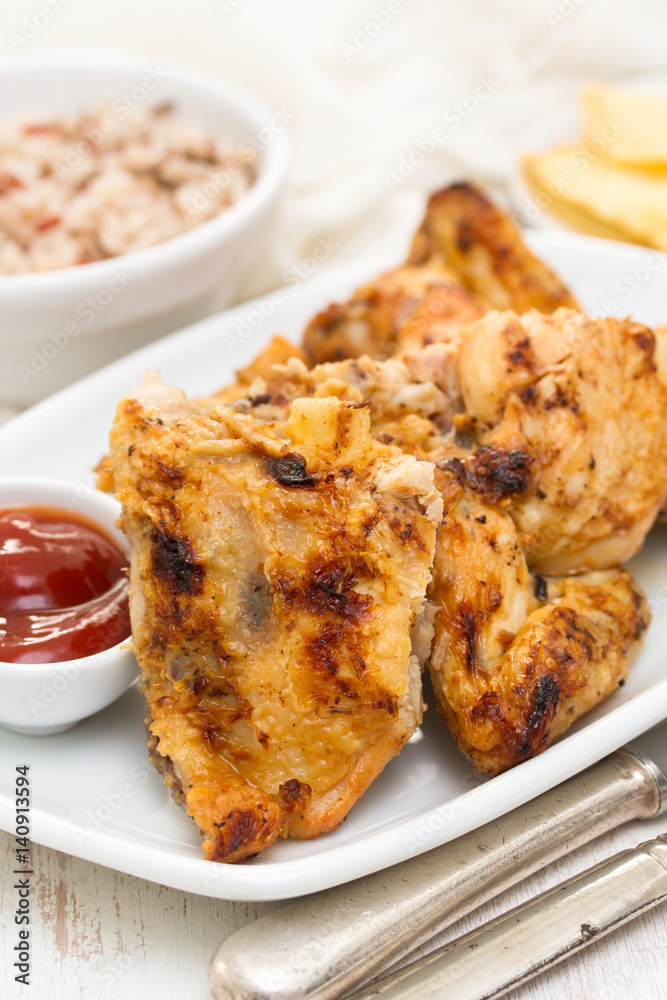 grilled chicken with sauce on dish