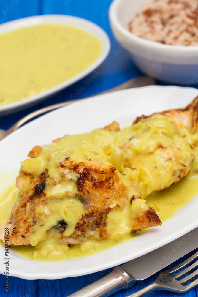 chicken with sauce on white dish chicken with sauce on white dish