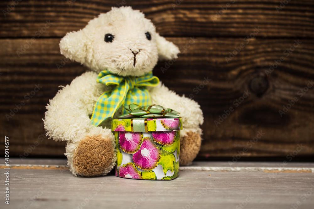 Obraz premium white lamd with little gift box