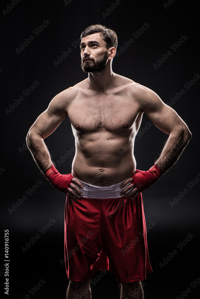 Fototapeta premium Boxer with wrapping hands