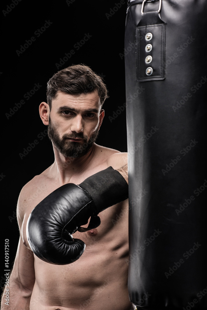 Boxer with punching bag