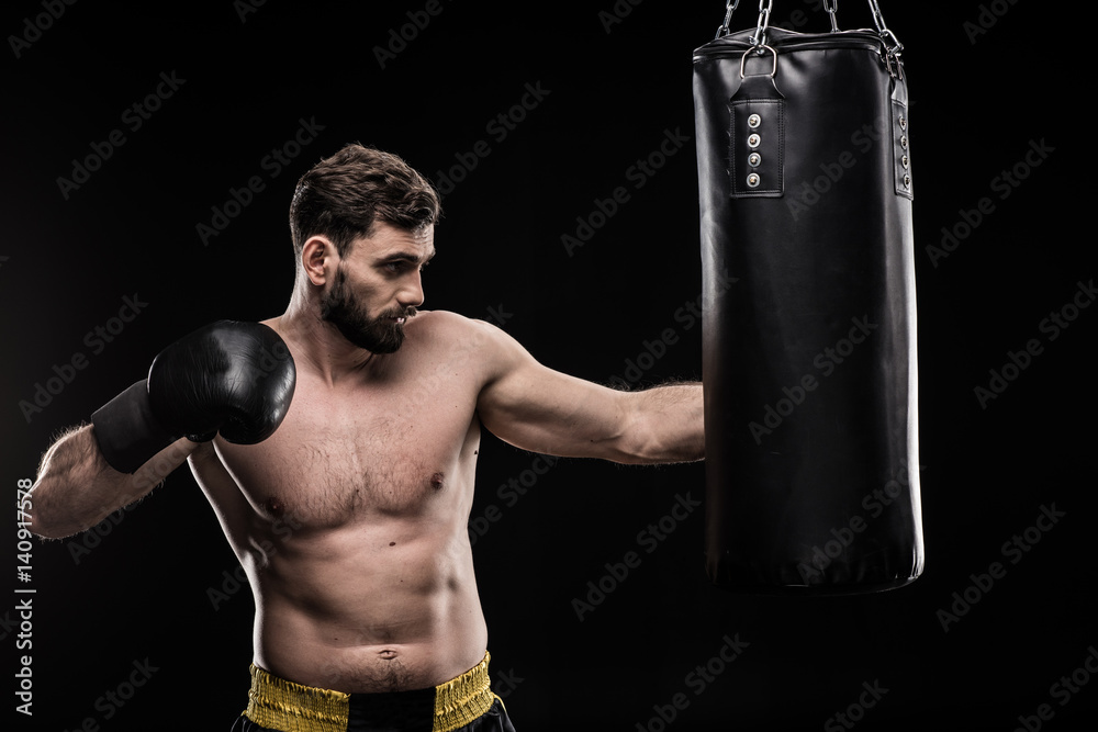 Boxer with punching bag