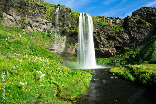 Waterfall Seljalandsfoss with rainbow in iceland.