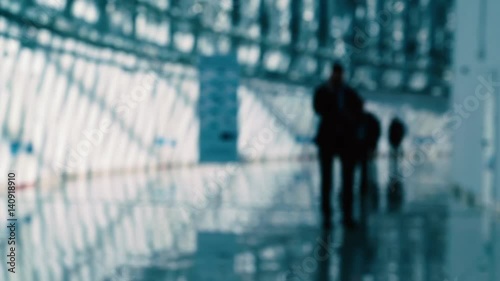 modern office interior, moving crowd,silhouettes